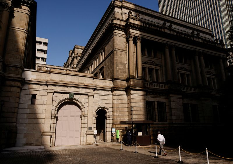 &copy; Reuters. FILE PHOTO: A man walks at the headquarters of Bank of Japan in Tokyo, Japan, January 18, 2023.   REUTERS/Issei Kato/File photo