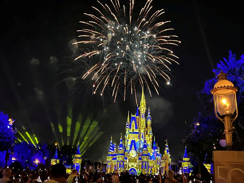 &copy; Reuters. FILE PHOTO: People attend the "Happily Ever After" fireworks display at the Walt Disney World Magic Kingdom theme park in Orlando, Florida, U.S. July 30, 2022.  REUTERS/Octavio Jones/File Photo