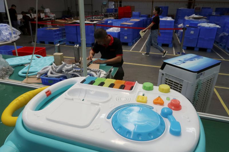 &copy; Reuters. FILE PHOTO: Employees work on the production line of American infant product and toy manufacturer Kids2 Inc. at a factory in Jiujiang, Jiangxi province, China June 22, 2021. Picture taken June 22, 2021. REUTERS/Gabriel Crossley/File Photo