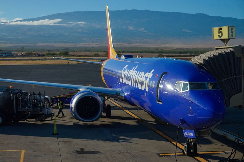 &copy; Reuters. FILE PHOTO: A Southwest plane is shown at the gate at Kahului Airport in Kahului, Maui, Hawaii, U.S., August 16, 2023.  REUTERS/Mike Blake/File Photo