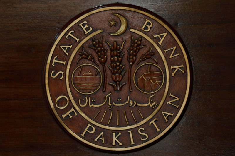 © Reuters. FILE PHOTO: The logo of the State Bank of Pakistan (SBP) is pictured on a reception desk at the head office in Karachi, Pakistan July 16, 2019. REUTERS/Akhtar Soomro/File Photo