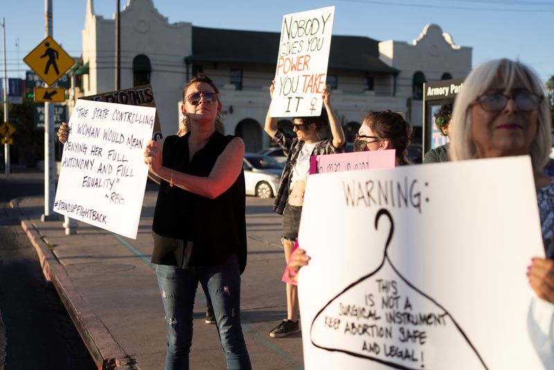 &copy; Reuters. FILE PHOTO: Abortion rights protesters march through downtown Tucson in part with nationwide demonstrations following the leaked Supreme Court opinion suggesting the possibility of overturning the Roe v. Wade abortion rights decision, in Tucson, Arizona, 