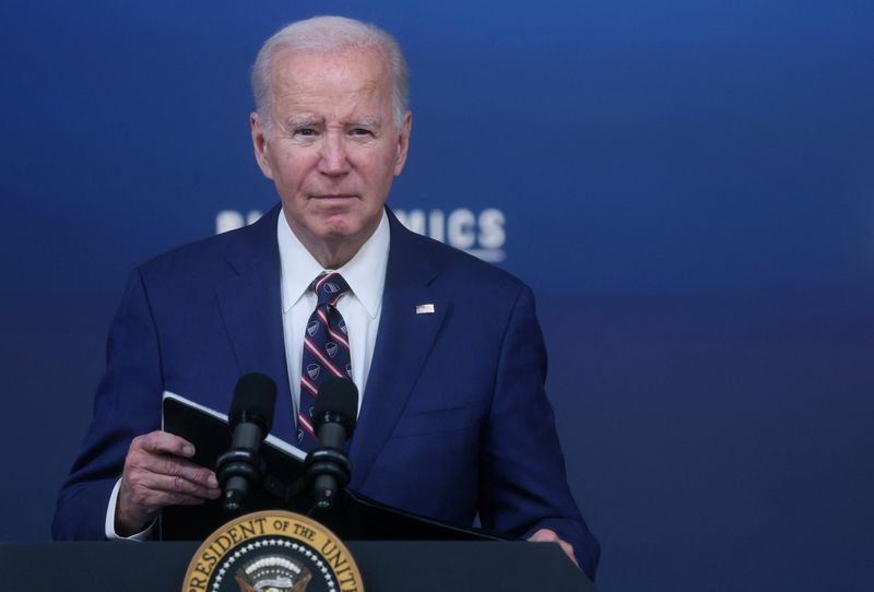 &copy; Reuters. U.S. President Joe Biden listens to a question from a reporter after speaking at an event about the economy, at the White House in Washington, U.S., October 23, 2023. REUTERS/Leah Millis/File Photo