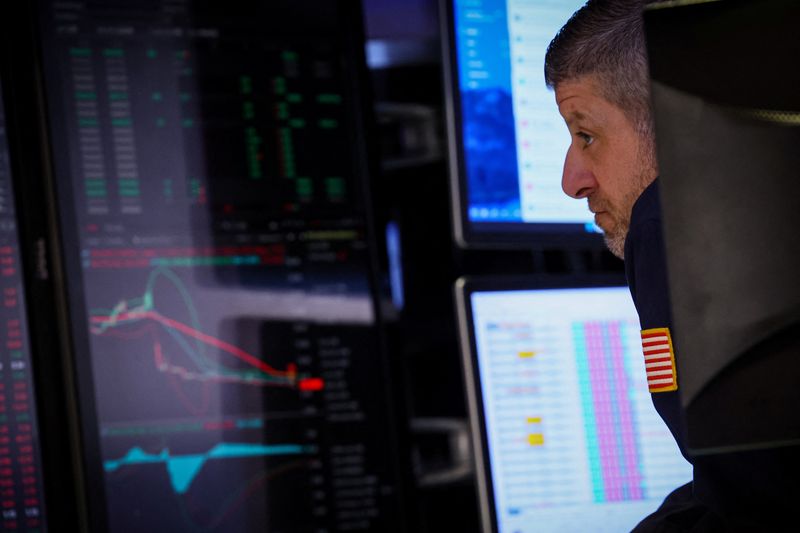 &copy; Reuters. A trader works at his post on the floor at the New York Stock Exchange (NYSE) in New York City, U.S., October 23, 2023.  REUTERS/Brendan McDermid