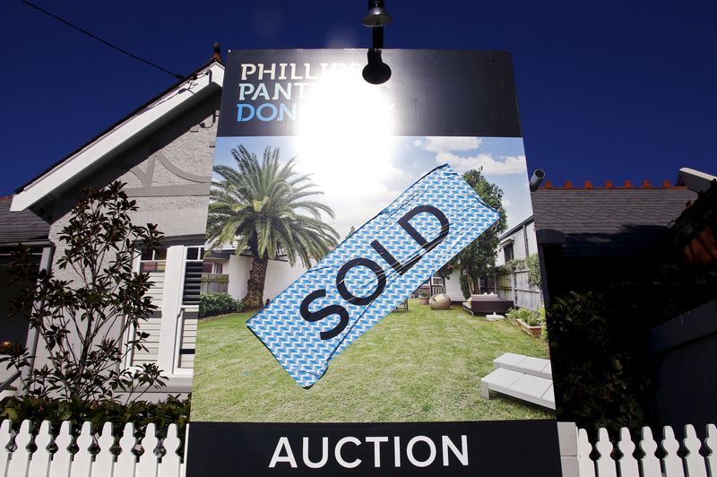 &copy; Reuters. FILE PHOTO: A sign stands at the front of a house after it was sold at an auction in the Sydney suburb of Waverley in Australia May 28, 2015. REUTERS/David Gray/File Photo