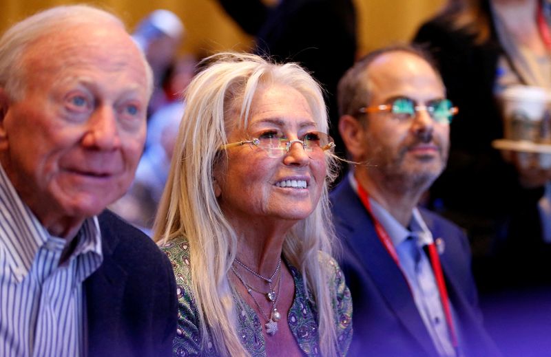 &copy; Reuters. FILE PHOTO: Miriam Adelson listens to Republican U.S. presidential candidate and former U.S. President Donald J. Trump during the Republican Jewish Coalition Annual Leadership Summit in Las Vegas, Nevada, U.S. October 28, 2023. REUTERS/Steve Marcus/File P