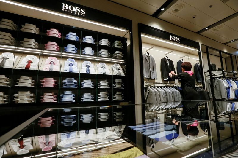 &copy; Reuters. FILE PHOTO: An employee displays clothes in the Hugo Boss section in the Central Universal Department Store (TsUM) in Kiev, Ukraine, May 17, 2017. Picture taken May 17, 2017. REUTERS/Valentyn Ogirenko/File Photo