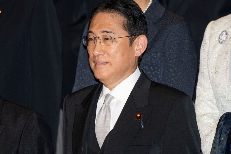 &copy; Reuters. FILE PHOTO: Japanese Prime Minister Fumio Kishida poses during a photo session with his new cabinet members at the prime minister's official residence in Tokyo, Japan, September 13, 2023. Zhang Xiaoyu/Pool via REUTERS/File Photo