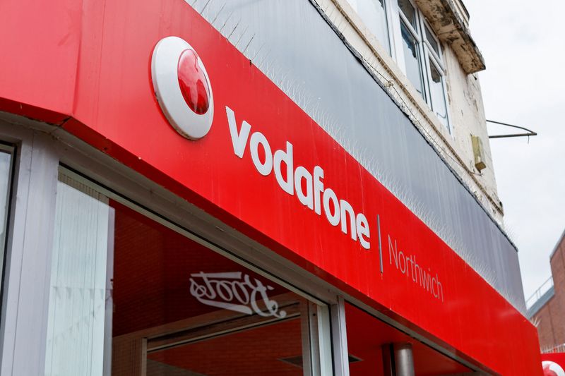 &copy; Reuters. The logo of Vodafone is seen at a Vodafone store in Northwich, Cheshire, Britain, June 7, 2023. REUTERS/Jason Cairnduff