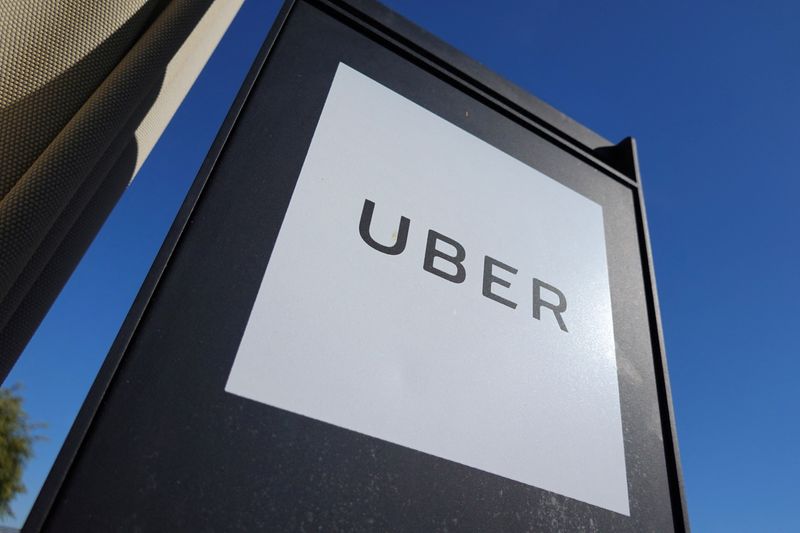 &copy; Reuters. FILE PHOTO: An Uber sign is seen at a shopping mall in San Diego, California, U.S., November 23, 2022.  REUTERS/Mike Blake/File Photo