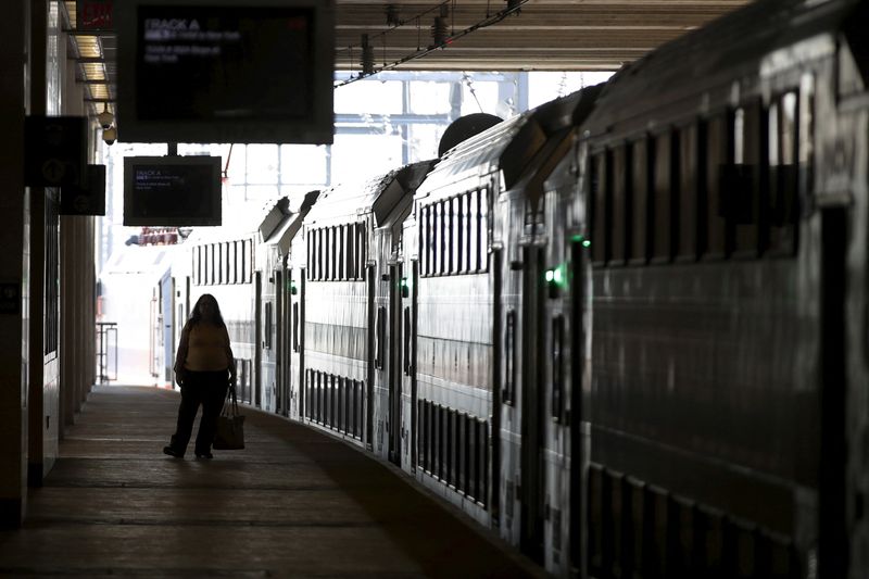 &copy; Reuters. FILE PHOTO: A commuter stands on the platform as a New Jersey Transit commuter train bound for New York City arrives at the Secaucus Junction station in Secaucus, New Jersey, March 10, 2016.  REUTERS/Mike Segar/File Photo