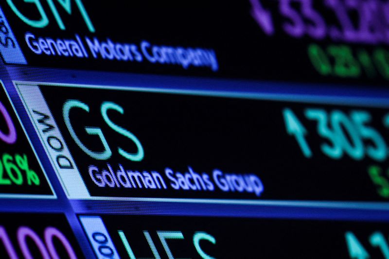 &copy; Reuters. FILE PHOTO: A screen displays the trading information for Goldman Sachs on the floor of the New York Stock Exchange (NYSE) in New York City, U.S., October 17, 2022. REUTERS/Brendan McDermid/File Photo