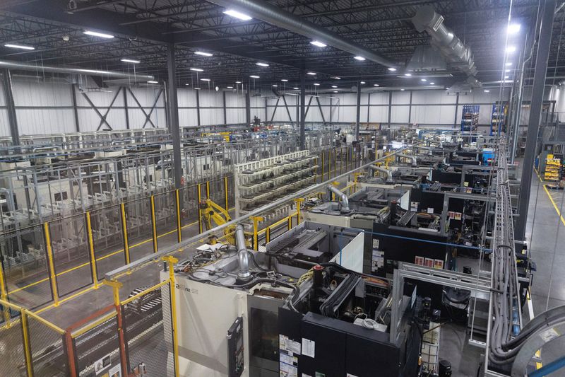 &copy; Reuters. FILE PHOTO: A general view of the factory floor and numerous automated machines used in the production and manufacturing of aircraft parts, at Abipa Canada in Boisbriand, Quebec, Canada May 10, 2023. REUTERS/Evan Buhler/File Photo