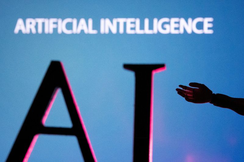 &copy; Reuters. مجسم ليد روبوتية أمام كلمة الذكاء الاصطناعي (إيه.آي) في صورة توضيحية التقطت يوم 23 يونيو حزيران 2023. تصوير: دادو روفيتش- رويترز.