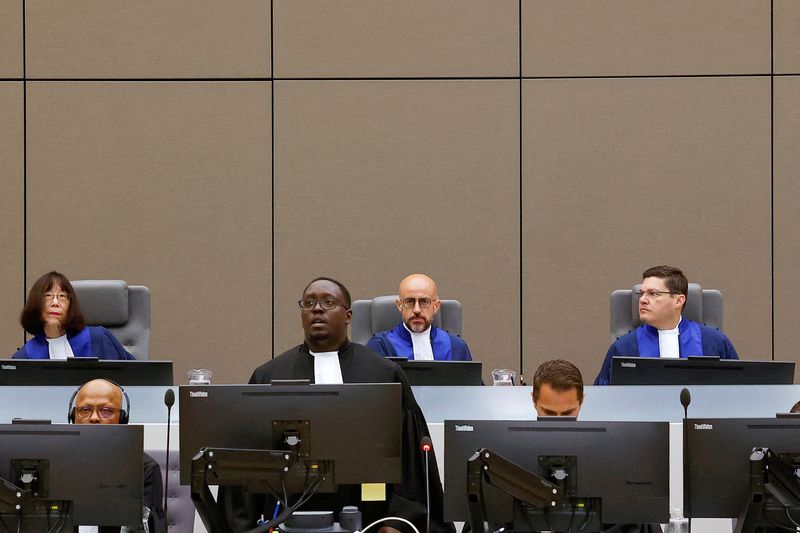 &copy; Reuters. FILE PHOTO: Judge Rosario Salvatore Aitala, Judge Tomoko Akane and Judge Sergio Gerardo Ugalde Godinez attend the International Criminal Court, as it holds hearings to determine the exact charges it will bring against former Central African Republic milit