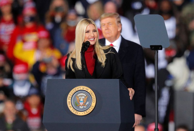 &copy; Reuters. White House Senior Advisor Ivanka Trump speaks in front of U.S. President Donald Trump as they campaign for Republican Senator Kelly Loeffler on the eve of the run-off election to decide both of Georgia's Senate seats, in Dalton, Georgia, U.S., January 4,