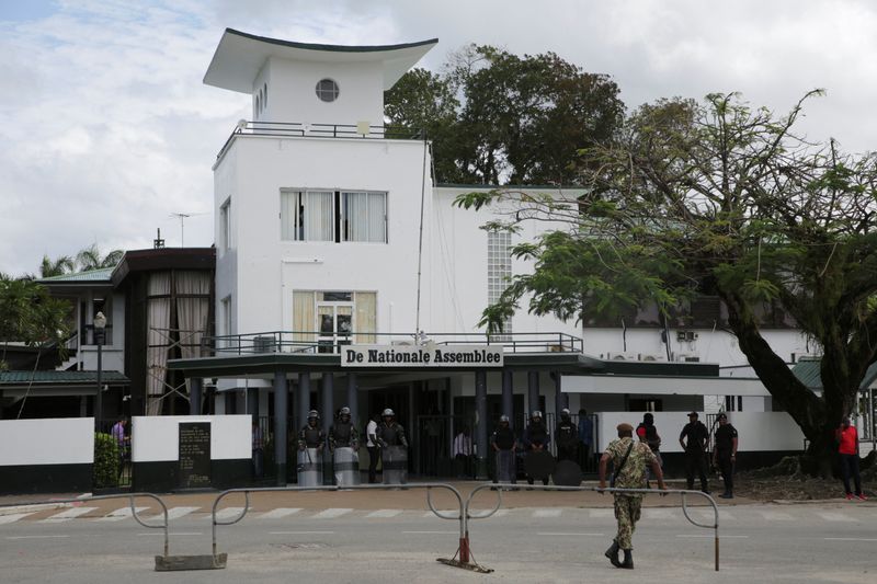 &copy; Reuters. FILE PHOTO: Security forces keep watch outside Suriname's parliament in Paramaribo, Suriname February 20, 2023. REUTERS/Ranu Abhelakh/FIle Photo