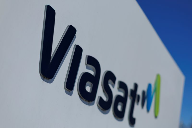 &copy; Reuters. FILE PHOTO: A Viasat corporate logo is shown on a sign at the company's headquarters in Carlsbad, California, U.S. March 9, 2022. Picture taken March 9, 2022. REUTERS/Mike Blake/File Photo