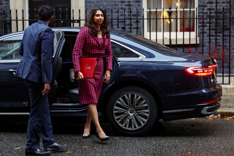 &copy; Reuters. FILE PHOTO: Britain's Home Secretary Suella Braverman walks outside Number 10 Downing Street, in London, Britain, October 24, 2023. REUTERS/Hannah McKay/File Photo
