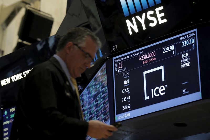&copy; Reuters. FILE PHOTO: A trader passes by a screen that displays the trading info for Intercontinental Exchange Inc. (ICE) on the floor of the New York Stock Exchange (NYSE) March 1, 2016. REUTERS/Brendan McDermid