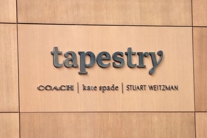 &copy; Reuters. FILE PHOTO: A signage is seen in the offices of Tapestry, Inc., in Manhattan, New York, U.S., November 19, 2021. REUTERS/Andrew Kelly