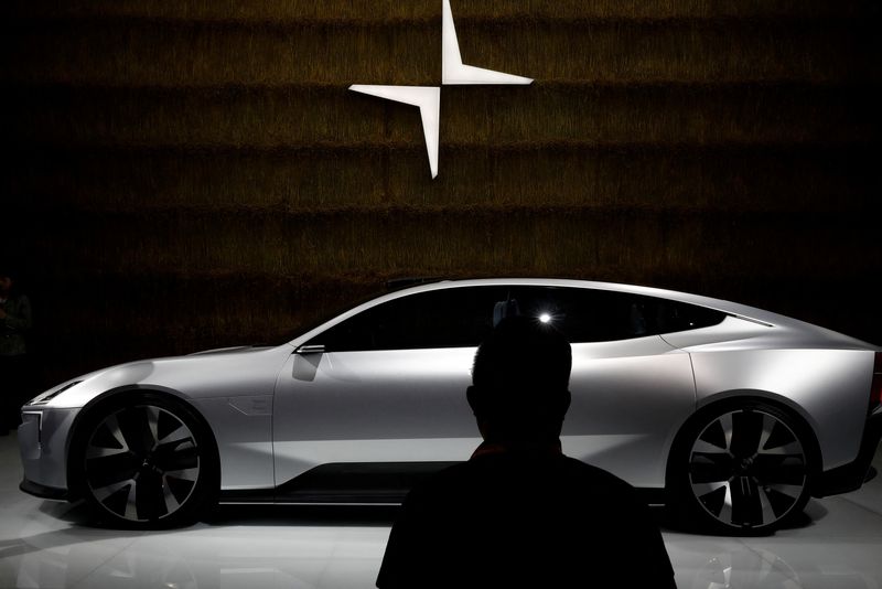&copy; Reuters. FILE PHOTO: A man looks at a Polestar Precept car at the Beijing International Automotive Exhibition, or Auto China show, in Beijing, China September 26, 2020. REUTERS/Thomas Peter/File Photo
