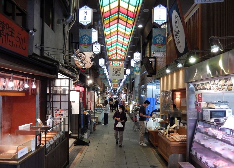 &copy; Reuters. Shoppers are seen at Nishiki Market in Kyoto, western Japan June 18, 2022. Picture taken June 18, 2022. REUTERS/Satoshi Sugiyama/File Photo