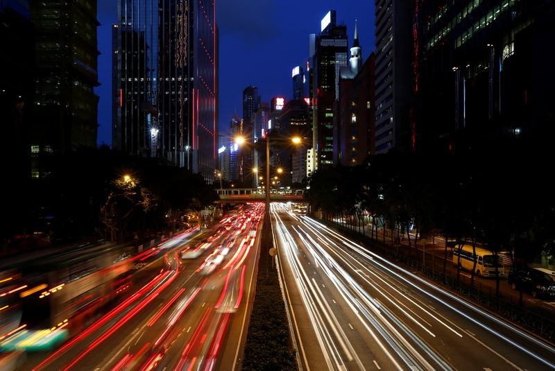 &copy; Reuters. Traffic is seen between office buildings at sunset in downtown Hong Kong, China  June 29, 2017. Picture taken June 29, 2017.      REUTERS/Bobby Yip/File Photo