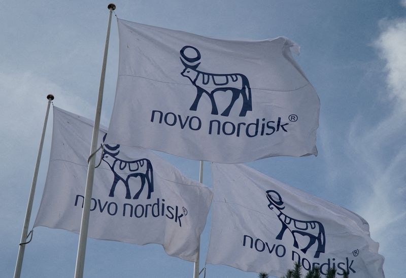 &copy; Reuters. FILE PHOTO: Flags with the Novo Nordisk logo flutter outside their Danish company's offices in Copenhagen, Denmark, September 26, 2023. REUTERS/Tom Little