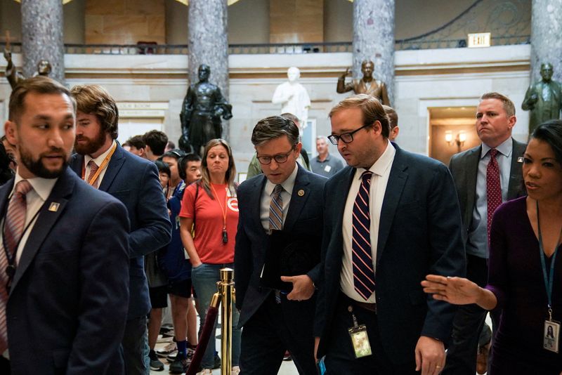 &copy; Reuters. FILE PHOTO: Newly-elected U.S. House Speaker Mike Johnson (R-LA) walks from his office to the House floor at the U.S. Capitol in Washington, U.S., October 26, 2023.REUTERS/Sarah Silbiger/File Photo