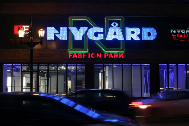 &copy; Reuters. FILE PHOTO: The name of fashion executive and designer Peter Nygard is illuminated on a flagship store he once owned in Winnipeg, Manitoba, Canada December 15, 2020.  REUTERS/Shannon VanRaes
