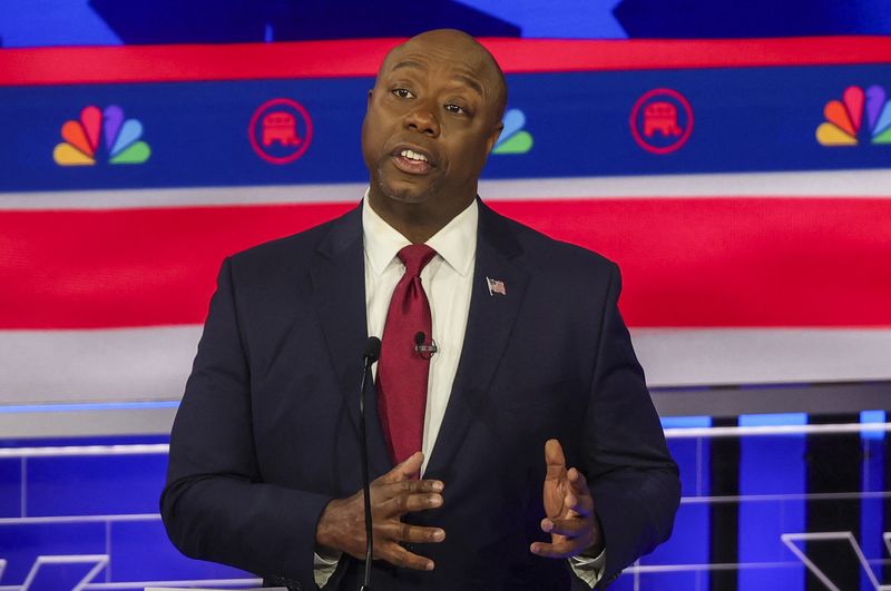 © Reuters. U.S. Senator Tim Scott (R-SC) speaks at the third Republican candidates' U.S. presidential debate of the 2024 U.S. presidential campaign hosted by NBC News at the Adrienne Arsht Center for the Performing Arts in Miami, Florida, U.S., November 8, 2023. REUTERS/Mike Segar