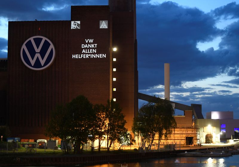 &copy; Reuters. A slogan reading "VW thanks all Helpers" is displayed on a building at Volkswagen's headquarters to celebrate the plant's re-opening during the spread of the coronavirus disease (COVID-19) in Wolfsburg, Germany April 25, 2020. REUTERS/Fabian Bimmer/File P