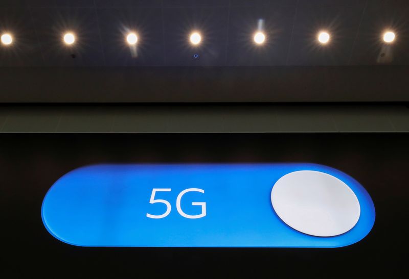&copy; Reuters. FILE PHOTO: An advertising board shows a 5G logo at the International Airport in Zaventem, Belgium May 4, 2020. REUTERS/Yves Herman/File Photo