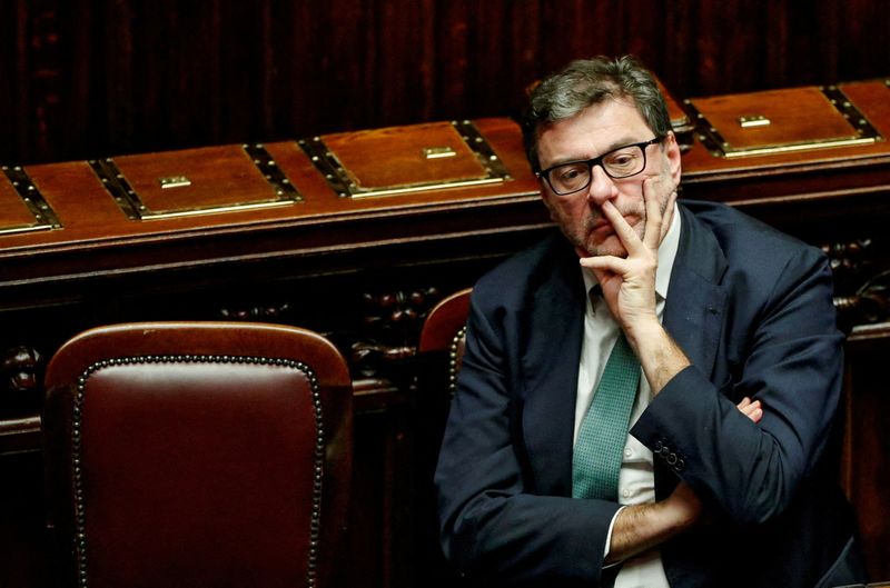 &copy; Reuters. FILE PHOTO: Italian Economy Minister Giancarlo Giorgetti looks on during a confidence vote over the 2023 budget at the lower house of the parliament, in Rome, Italy December 23, 2022. REUTERS/Remo Casilli//File Photo/File Photo