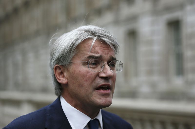 © Reuters. Conservative Party chief whip Andrew Mitchell speaks to members of the media as he arrives at the Cabinet Office in London September 24, 2012. Mitchell on Monday reiterated his apology to a police officer, following an incident in which he admitted making unacceptable comments after being told to get off his bicycle as he left Downing Street. REUTERS/Stefan Wermuth (BRITAIN - Tags: POLITICS CRIME LAW)