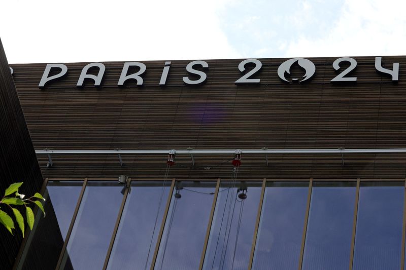 &copy; Reuters. The logo of the Paris 2024 Olympics and Paralympics Games is seen on the Pulse building, the headquarters of the Paris 2024 Olympics organizing committee, as a police search is currently underway, in Saint-Denis near Paris, France, June 20, 2023. REUTERS/