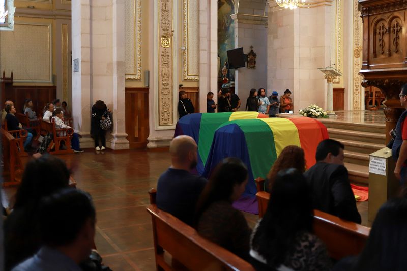 &copy; Reuters. People attend the mass funeral for Mexico's first openly non-binary magistrate and LGBTQ activist, Ociel Baena, and their partner, Dorian Daniel Nieves Herrera, in Aguascalientes, Mexico. November 14, 2023. REUTERS/Edgar Chavez