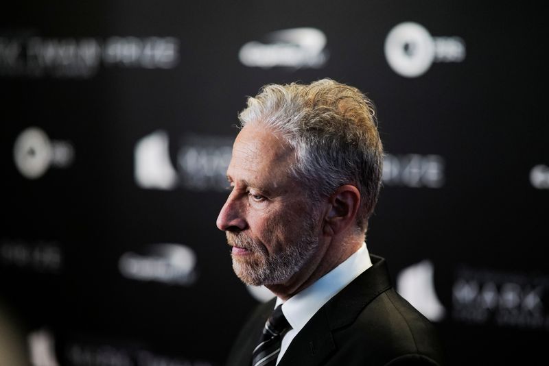 &copy; Reuters. FILE PHOTO: Comedian and talk show host Jon Stewart arrives on the red carpet before receiving the Mark Twain Prize For American Humor, at The Kennedy Center in Washington, U.S., April 24 2022.  REUTERS/Cheriss May/File Photo