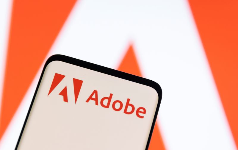 &copy; Reuters. FOTO DE ARQUIVO: Logotipo da Adobe é visto no smartphone nesta ilustração tirada em 13 de junho de 2022. REUTERS/Dado Ruvic/Ilustração