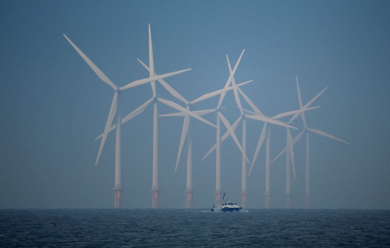 &copy; Reuters. FILE PHOTO: A survey vessel sails past wind turbines at the Burbo Bank offshore wind farm near New Brighton, Britain, January 23, 2023. REUTERS/Phil Noble/File Photo