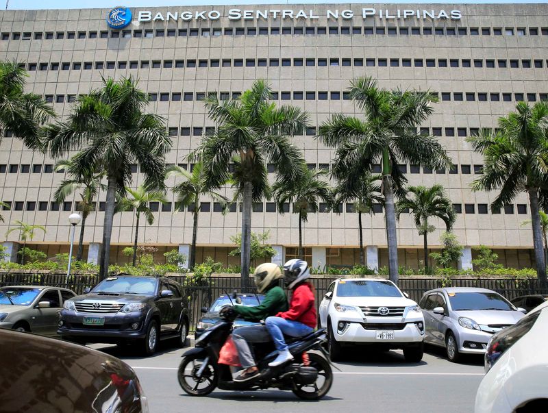 &copy; Reuters. FILE PHOTO: A motorcycle pases a building of the Bangko Sentral ng Pilipinas (Central Bank of the Philippines) in Manila, Philippines April 28, 2016. REUTERS/Romeo Ranoco/File Photo