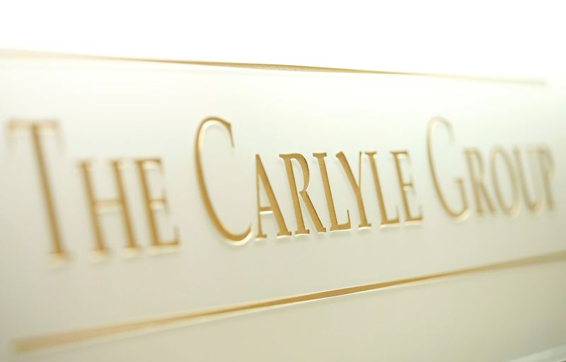 © Reuters. FILE PHOTO: The logo of the Carlyle Group is displayed at the company's office in Tokyo, Japan October 17, 2018. REUTERS/Issei Kato