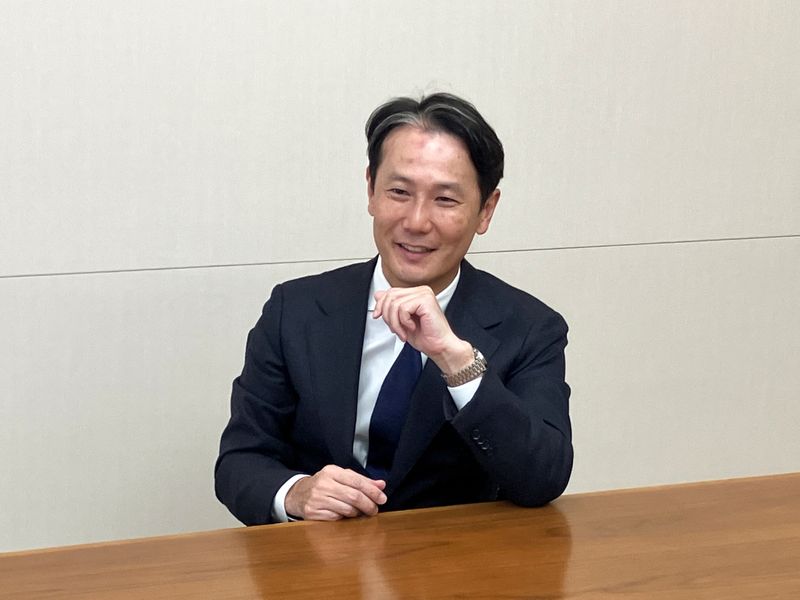 © Reuters. Mitsubishi Corp's Chief Stakeholder Engagement Officer Kenji Kobayashi speaks about his role at Mitsubishi's office in Tokyo, Japan, November 16, 2023. REUTERS/Anton Bridge