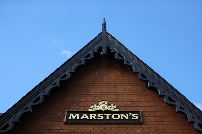 &copy; Reuters. A view shows a Marston's pub logo, following new restrictions to curb the spread of the coronavirus disease (COVID-19) infections, in Shobnall, in Burton-on-Trent, Britain October 15, 2020. REUTERS/Carl Recine/File Photo