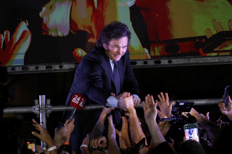 &copy; Reuters. Argentine president-elect Javier Milei greets supporters after winning Argentina's runoff presidential election, in Buenos Aires, Argentina November 19, 2023. REUTERS/Cristina Sille/ File Photo