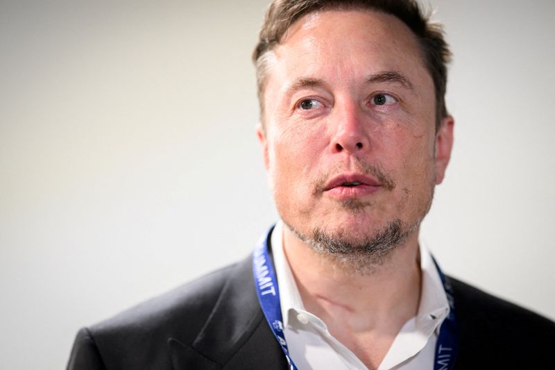 &copy; Reuters. FILE PHOTO: Tesla, X (formerly known as Twitter) and SpaceX's CEO Elon Musk speaks with members of the media during the AI Safety Summit at Bletchley Park in Bletchley, Britain on November 1, 2023.  Leon Neal/Pool via REUTERS/File Photo