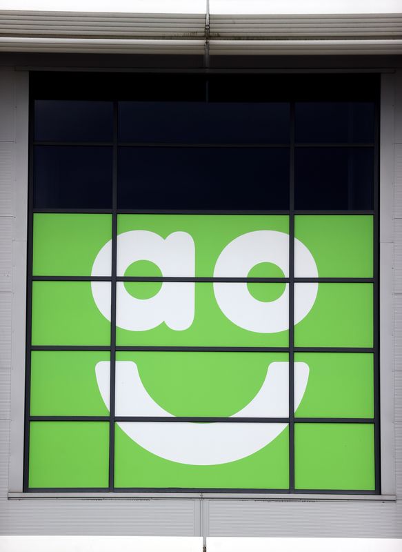 &copy; Reuters. A sign of AO is pictured outside the distribution centre in Crewe, Cheshire, Britain November 24, 2020. REUTERS/Carl Recine/File Photo