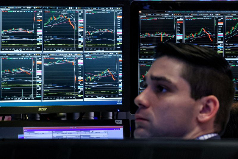 &copy; Reuters. FILE PHOTO: A trader works on the floor at the New York Stock Exchange (NYSE) in New York City, U.S., October 27, 2023.  REUTERS/Brendan McDermid/File Photo