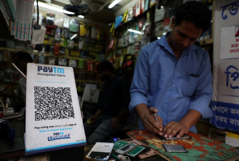 &copy; Reuters. A QR code of Paytm is seen at a mobile repairing shop in Kolkata, India, November 9, 2021. REUTERS/Rupak De Chowdhuri/File Photo
